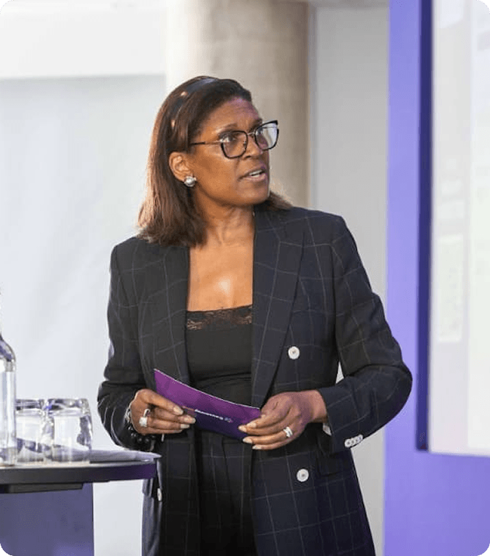 Juliette Foster speaking at a professional event