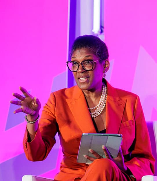 Juliette Foster speaking at a media and speaking engagement