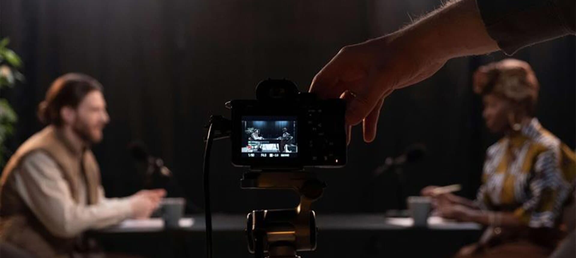 7 Secrets Image Camera View 2 People in Studio