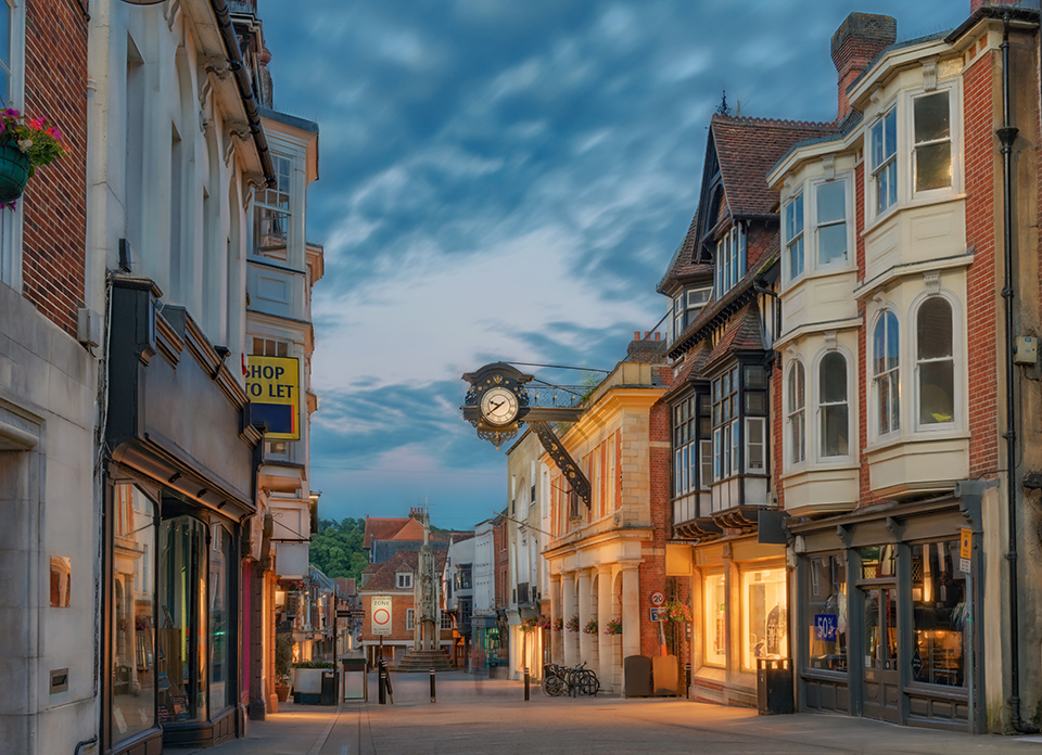 Winchester City centre High Street at night during mid-summer