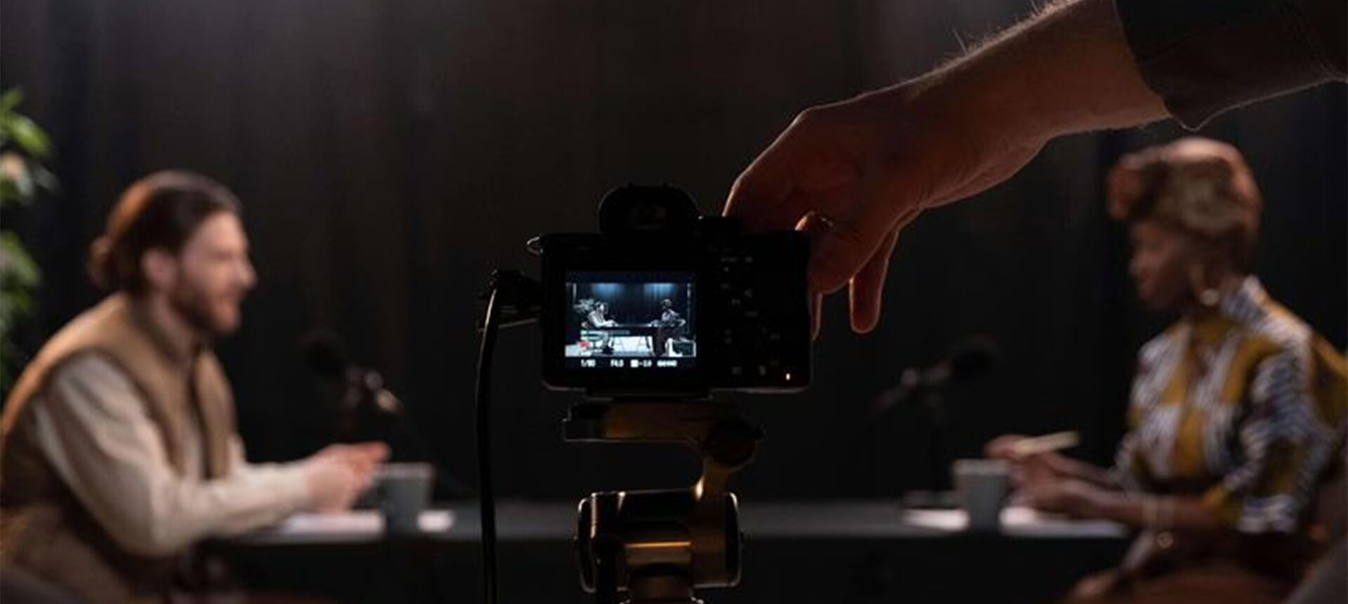 7 Secrets Image Camera View 2 People in Studio