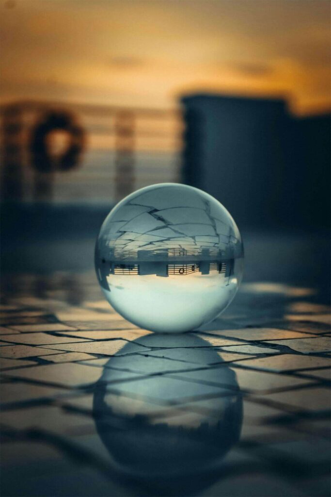 7 Secrets Image A Glass Ball Reflecting an Image
