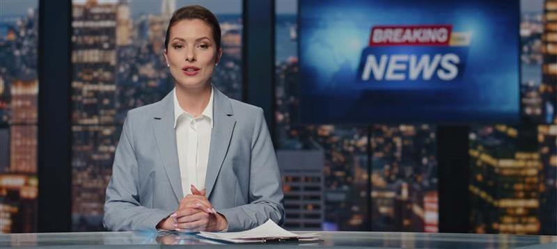 Television Presenter Communicating Clearly on UK TV